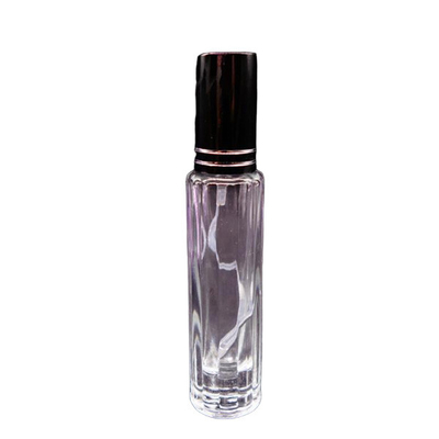 empty bottle of imported perfume recycled glass bottles black blue red pink green cap plastic and metal roll frog